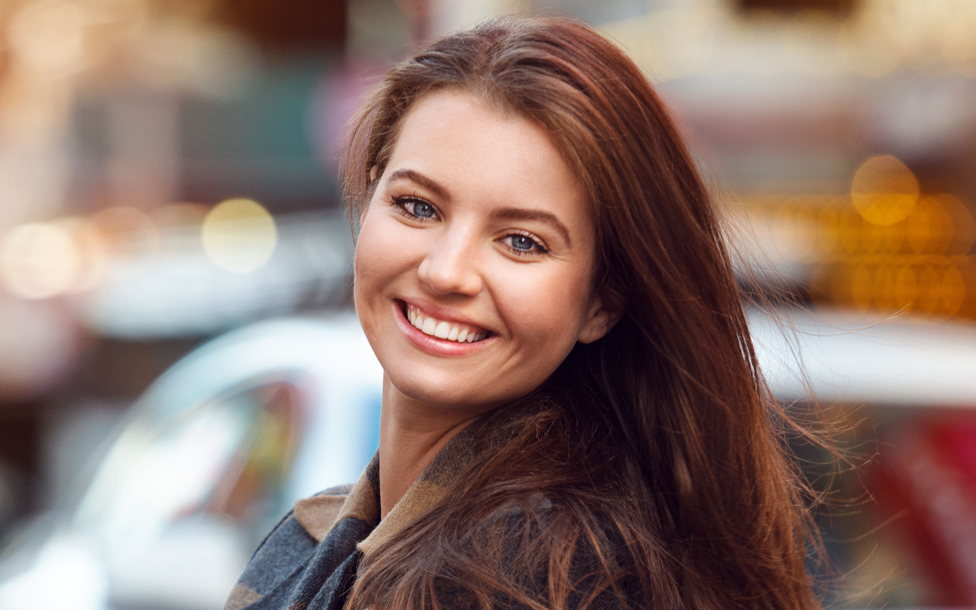 A young woman with perfect smile.